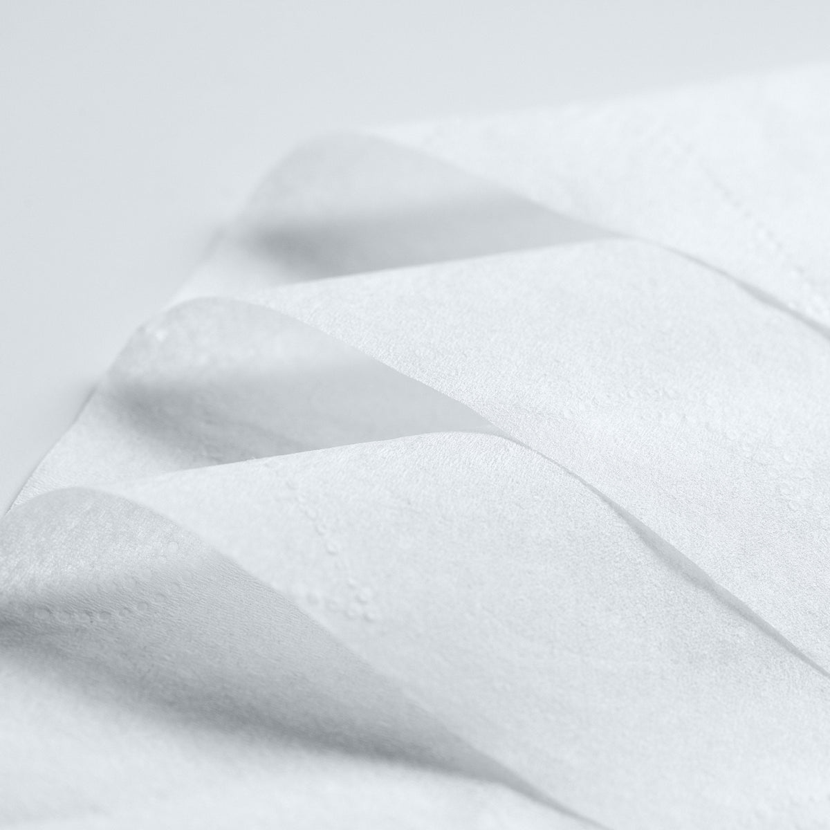Close-up of Enrich facial tissue showing ultra-soft 3-ply texture with zero dust